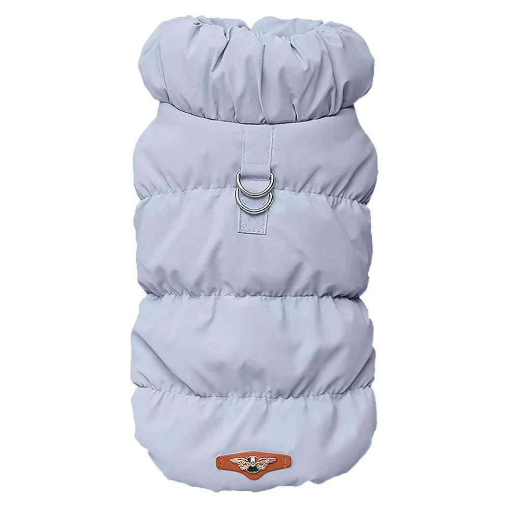 Small dog wearing SnuggleFit winter pet jacket outdoors